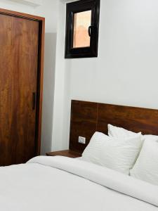 Cama o camas de una habitación en Prince Pyramids Inn Hotel