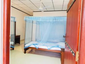 Llit o llits en una habitació de Yala Beach Resort
