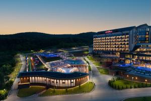 an aerial view of a large building at night at Movenpick Resort and Spa Fruske Terme in Vrdnik