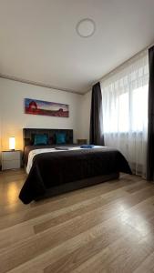 Lova arba lovos apgyvendinimo įstaigoje NeriesResort 3 Rooms Suite iN Centrum