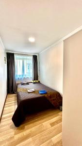 Lova arba lovos apgyvendinimo įstaigoje NeriesResort 3 Rooms Suite iN Centrum