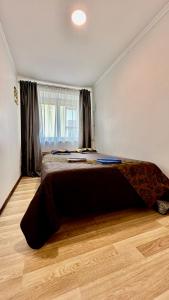 Lova arba lovos apgyvendinimo įstaigoje NeriesResort 3 Rooms Suite iN Centrum