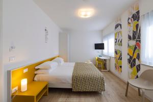 Voodi või voodid majutusasutuse Art Hotel Principe toas