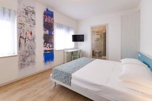 Voodi või voodid majutusasutuse Art Hotel Principe toas