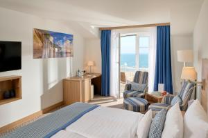 TV a/nebo společenská místnost v ubytování Hotel Bernstein
