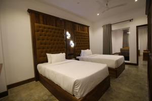 A bed or beds in a room at Hotel Refresh Blue