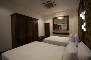 A bed or beds in a room at Hotel Refresh Blue