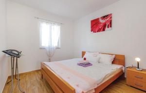 Postel nebo postele na pokoji v ubytování Holiday Home Petra