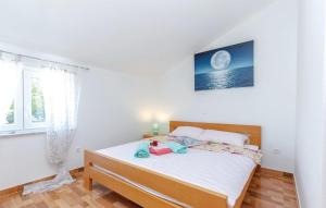 Postel nebo postele na pokoji v ubytování Holiday Home Petra