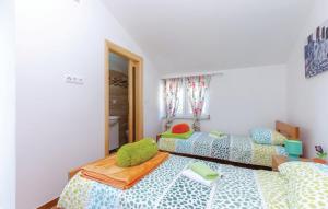 Postel nebo postele na pokoji v ubytování Holiday Home Petra
