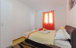 Postel nebo postele na pokoji v ubytování Holiday Home Petra