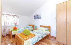 Postel nebo postele na pokoji v ubytování Holiday Home Petra