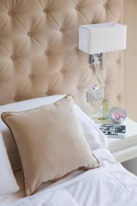 A bed or beds in a room at Hotel Mediterraneo
