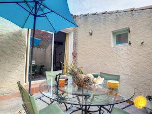 Patio lub wspólna przestrzeń na świeżym powietrzu w obiekcie Coeur de Fitou : Maison de village atypique