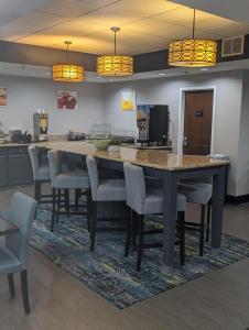 a conference room with a large table and chairs at Quality Inn Danville - University Area in Danville