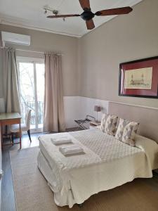 Postel nebo postele na pokoji v ubytování Casa Consell Apartments