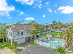 an image of a house with a swimming pool at Spacious 4 Bedroom House-2 Blocks From the Ocean-2185 Sanibel Court! in Myrtle Beach