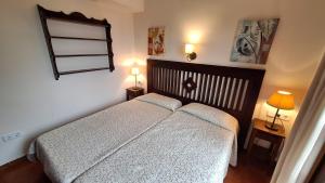Postel nebo postele na pokoji v ubytování Torre Vella 207