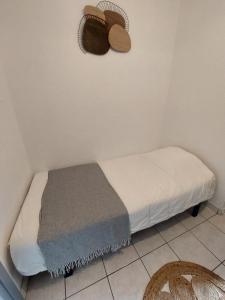 Llit o llits en una habitació de T3 avec terrasse, climatisation et parking