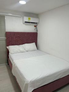 מיטה או מיטות בחדר ב-Villa oti