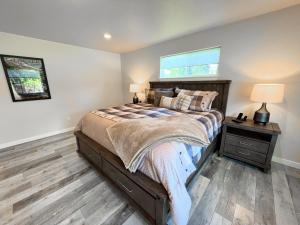 a bedroom with a bed and a window at Timber Ridge in Columbia Falls