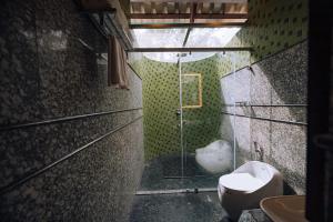 Ein Badezimmer in der Unterkunft Elixir Woods Luxury Resort And Spa, Munnar