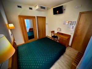 TV a/nebo společenská místnost v ubytování Hotel Ponte Molo