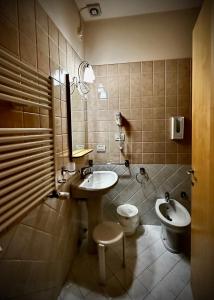 Koupelna v ubytování Hotel Ponte Molo