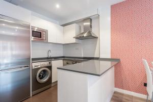 Kuchyň nebo kuchyňský kout v ubytování Apartamentos La Albarca
