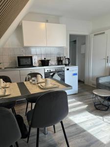 Dapur atau dapur kecil di Ferienwohnung Lohfelden Vibes +10 gambar