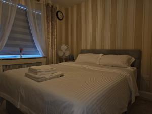 Postel nebo postele na pokoji v ubytování Comfortable Short Stay in Dublin