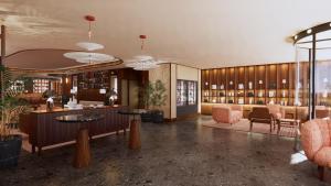 - un hall avec un bar, des tables et des chaises dans l'établissement EVOLUTION Valbom, à Lisbonne