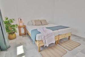 Ένα ή περισσότερα κρεβάτια σε δωμάτιο στο Sol y Luz