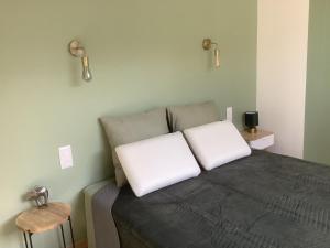 Llit o llits en una habitació de Gîte de L’entre Deux