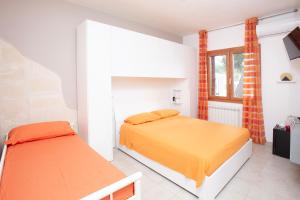 Ένα ή περισσότερα κρεβάτια σε δωμάτιο στο B&B Montedarena