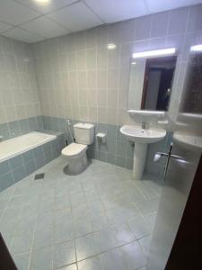 Koupelna v ubytování orient 1 BHK APARTMENT + 9 fotografií