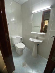 Koupelna v ubytování orient 1 BHK APARTMENT