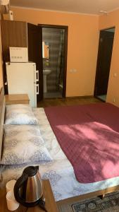 Postel nebo postele na pokoji v ubytování База відпочинку «Павлоградець»
