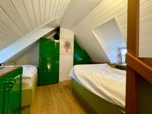 Ένα ή περισσότερα κρεβάτια σε δωμάτιο στο Haus Ahrens