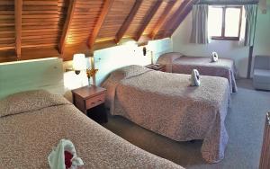 Letto o letti in una camera di Hotel Balandra