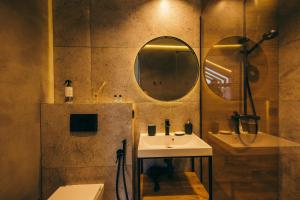 a bathroom with a sink and a mirror at Travy in Yaremche +224 photos