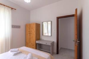 Postel nebo postele na pokoji v ubytování Beachside Apartment-1