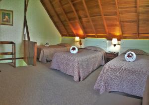 Letto o letti in una camera di Hotel Balandra