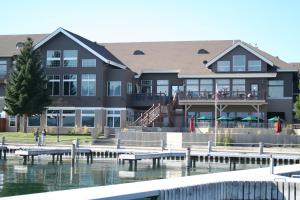 a large building with a marina in front of it at Kwataqnuk Resort & Casino in Polson