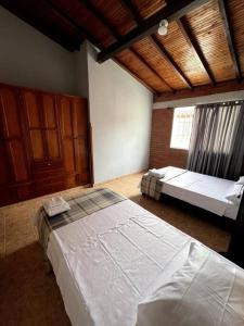 A bed or beds in a room at Casa amplia, en lugar tranquilo