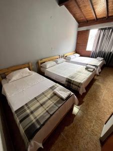 A bed or beds in a room at Casa amplia, en lugar tranquilo