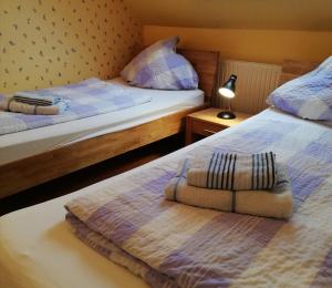 Ένα ή περισσότερα κρεβάτια σε δωμάτιο στο Sandhasen
