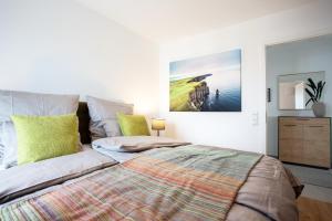Postel nebo postele na pokoji v ubytování Siebenschläfer Appartements