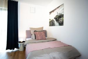 Postel nebo postele na pokoji v ubytování Siebenschläfer Appartements