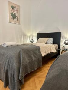 a bedroom with two beds in a room at Apartment Sophie - Old Town in Bratislava